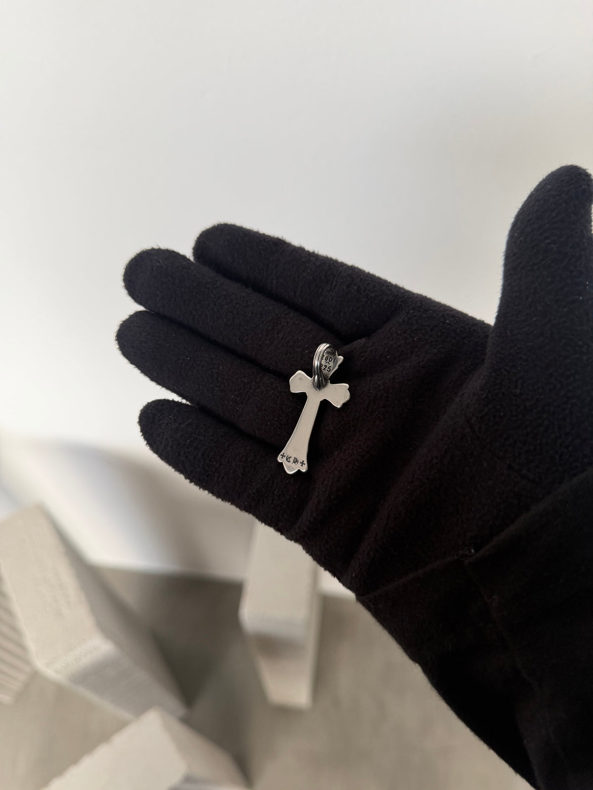 CH B cross pendant